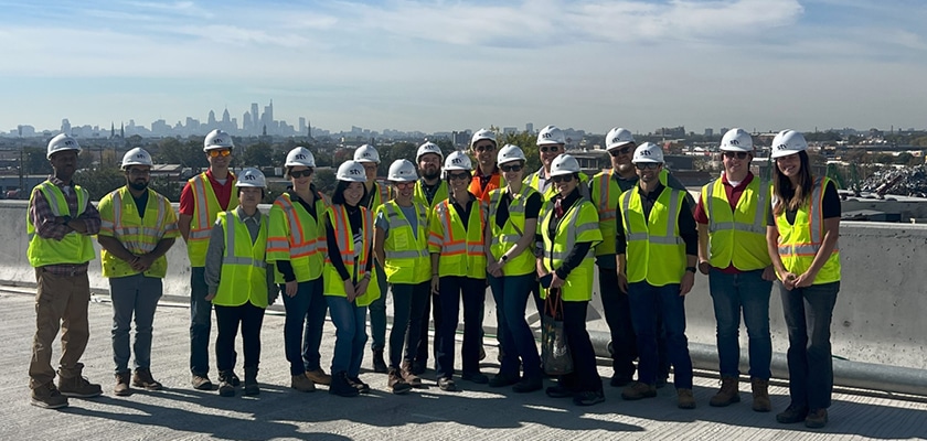 STV employees standing on bridge