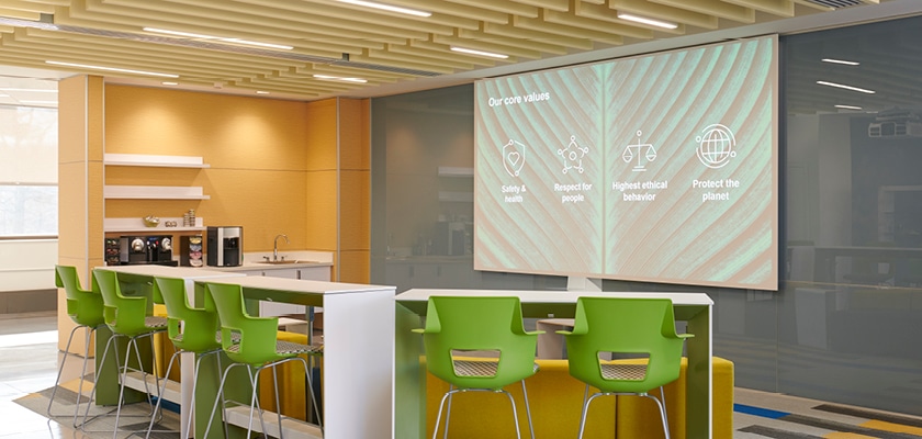 Kitchen and seating area with large projection screen