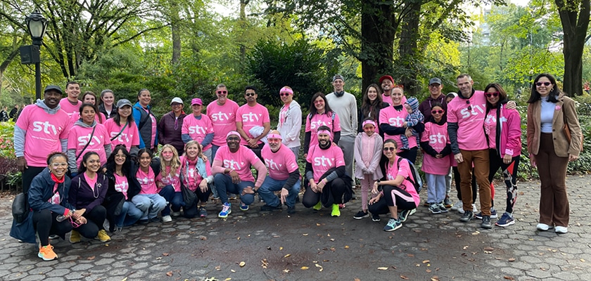 People posing in park after cancer walk