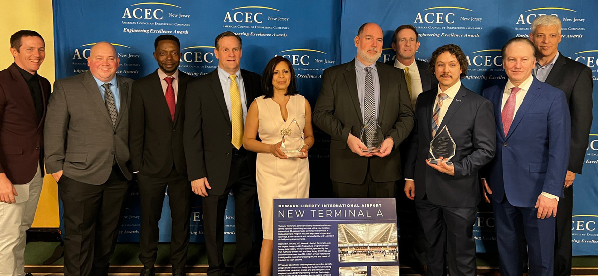 The STV team accepts the ACEC award for Newark Liberty Airport Terminal A