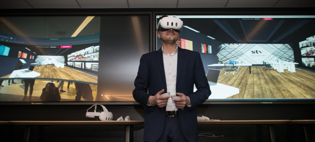 An STV employee demonstrates VR technology