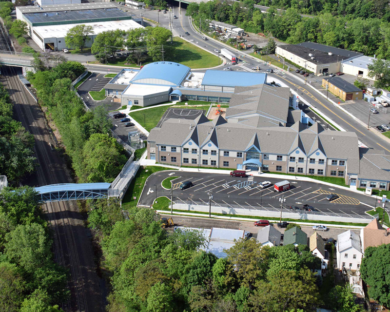 Aerial view of the school and pedestrian bridge