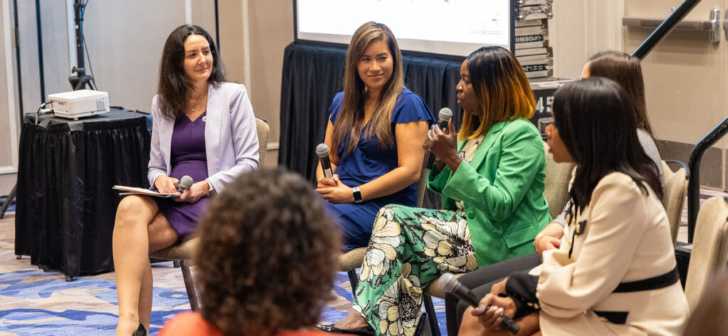 Patricia Macchi and STV Board member Lynda Tran participate in a panel.