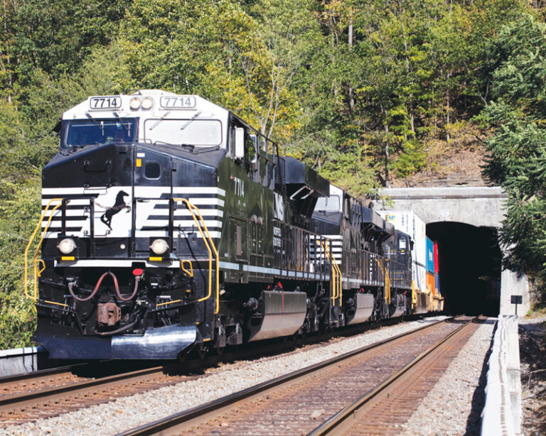 A freight train passing through a tunnel along the Heartland Corridor