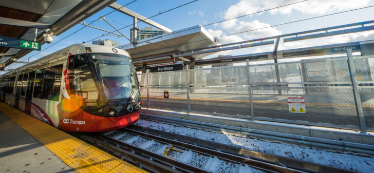 A Confederation Line LRT pulls into Hurdman Station