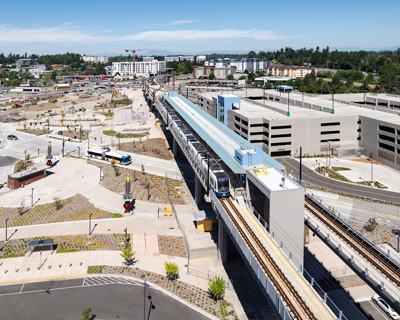 A four-car light rail vehicle stopped at the Lynnwood City Center station