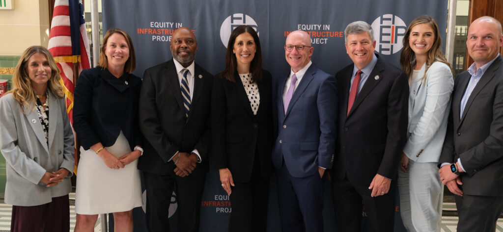 STV’s team celebrates Sound Transit’s commitment to the EIP. L-R: Heather Wills, Liz Justison, Philip A. Washington (EIP co-founder), Terri Mestas (Sound Transit), Greg Kelly, John D. Porcari (EIP co-founder, STV board member), Kristen Van Gilst, Bryan Williams.