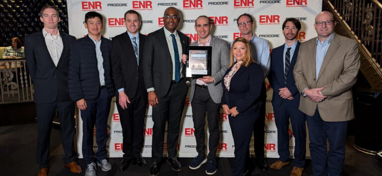 STV team members accept the ENR award