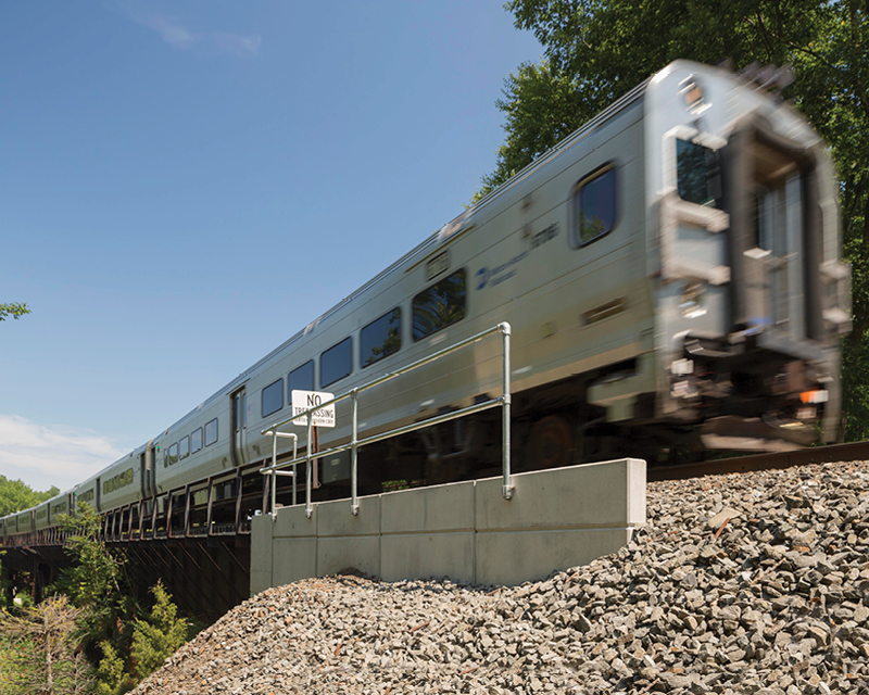 A train passes over the Woodbury Viaduct