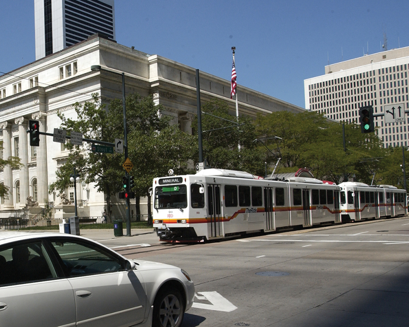 Denver RTD rail cars ride through the city