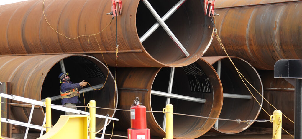 Large pipes being inspected.