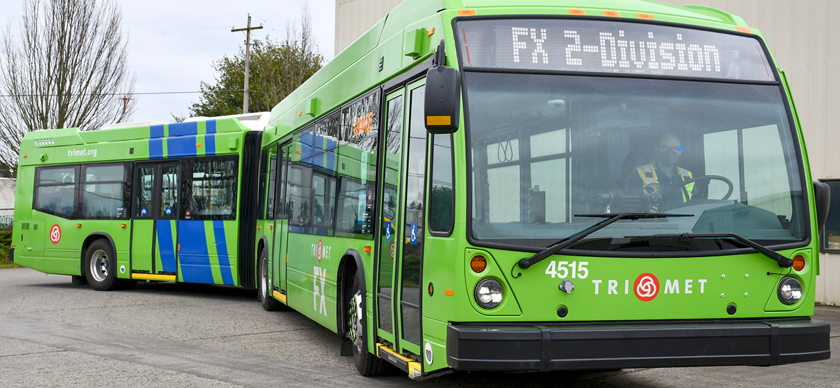 A TriMet bus pulls out of the facility.