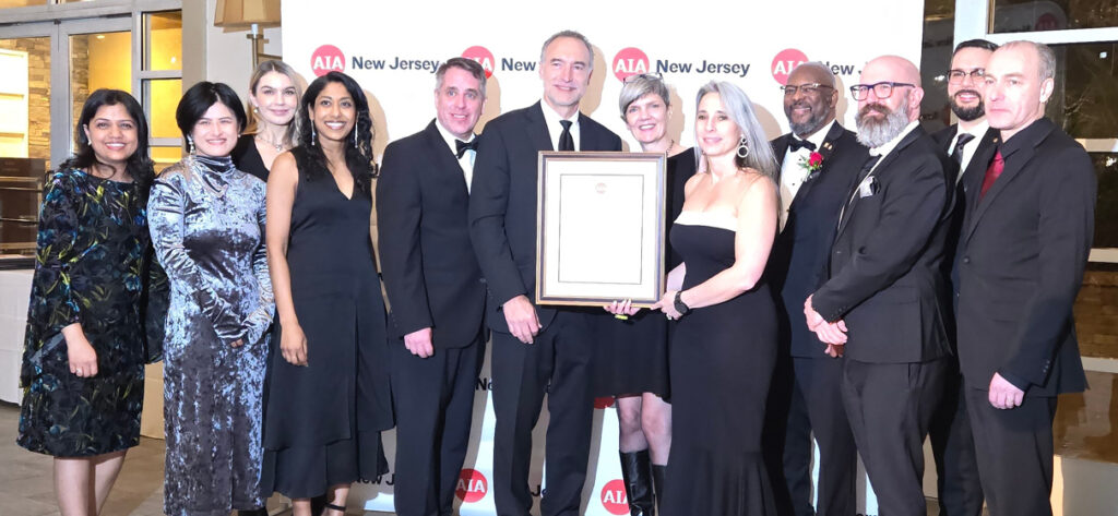 STV and Grimshaw staff celebrate winning the Merit Award for  Newark Liberty International Airport Terminal A  from the AIA New Jersey chapter.