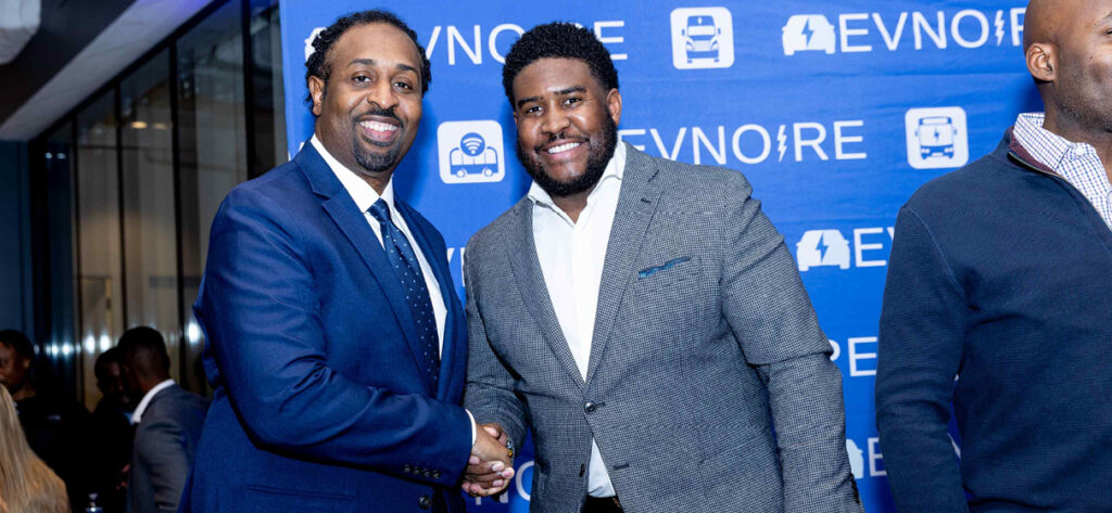 Keith Benjamin (right in photo) receive an award at EVNoire’s Annual Black & Latino Mobility/Transportation Professionals and Allies Reception