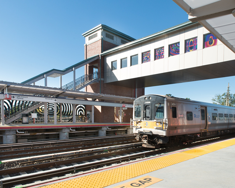 An LIRR train pulls into Elmont/UBS Arena station.