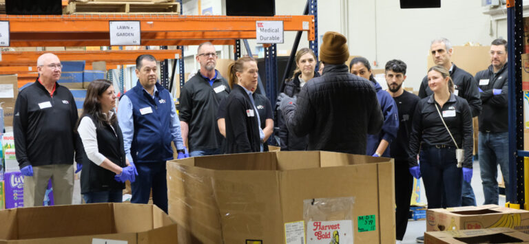 STV team members volunteer at the Second Harvest Food Bank of Metrolina