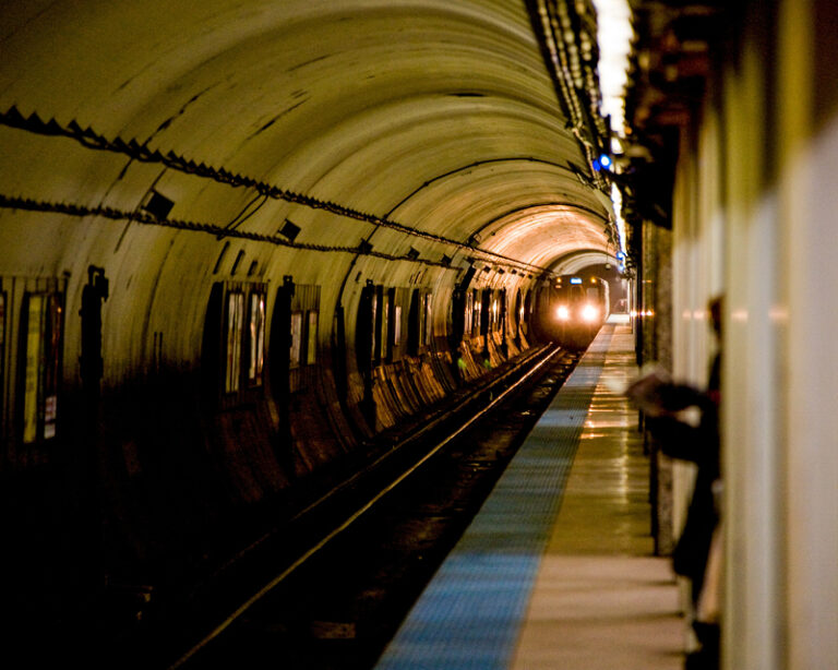 A CTA train pulls into station.