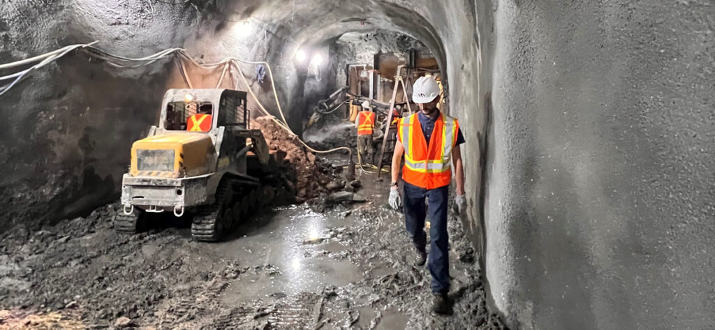 Overall view of East-West tunnel after completion of bench excavation (looking west)