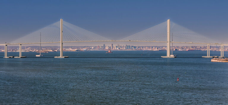 Daytime rendering of cable stayed span with downtown Baltimore in the background.