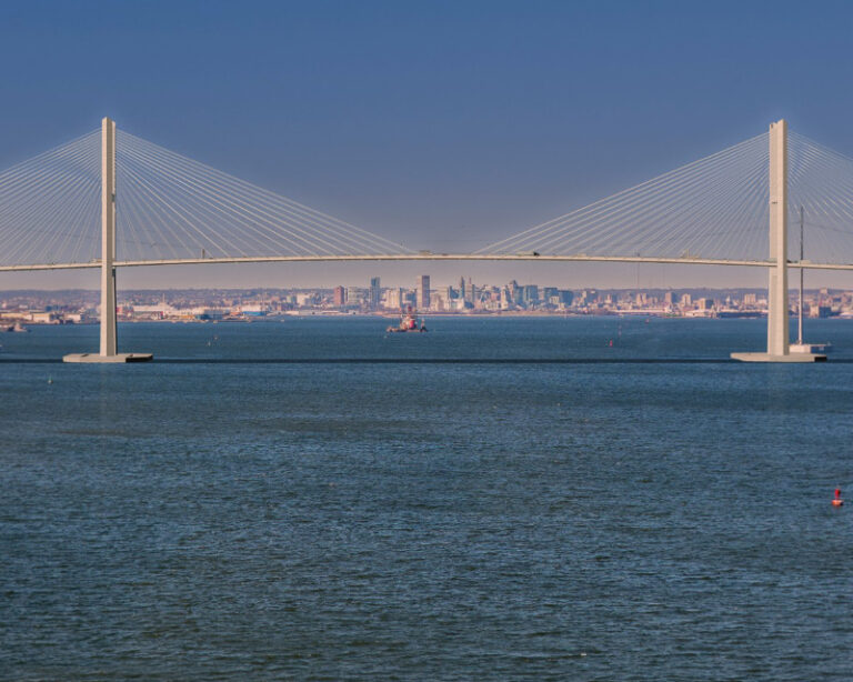 Daytime rendering of cable stayed span with downtown Baltimore in the background.