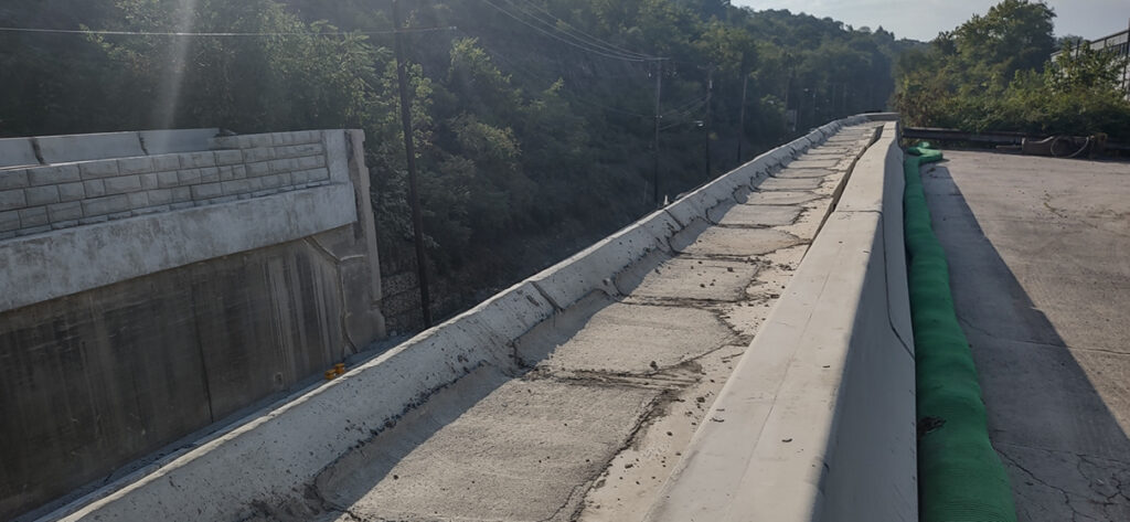 The bridge spanning Route 51 showed signs of deterioration.