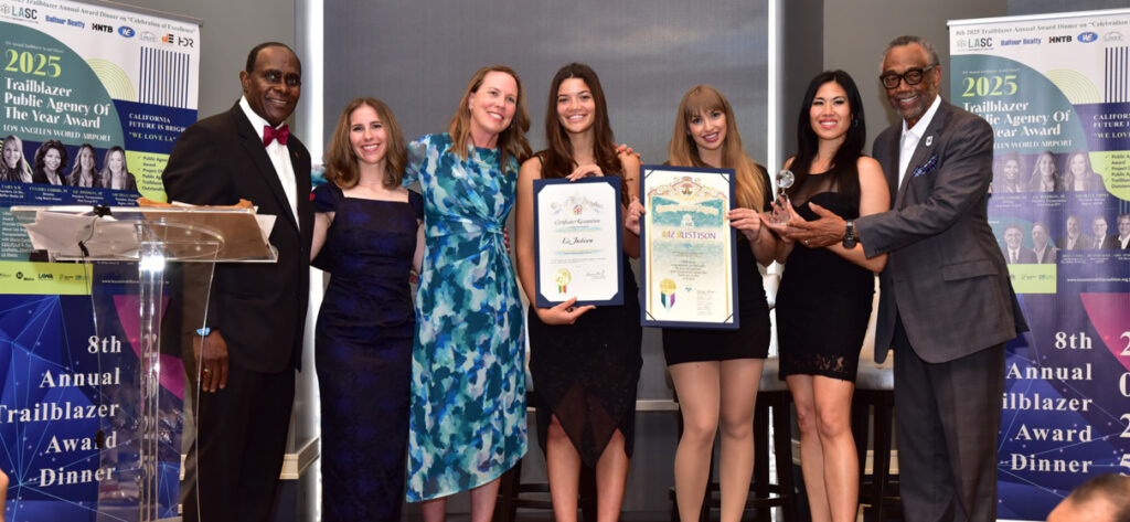 Liz Justison (third from left) receives here award from LASC