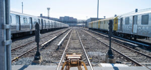 NYC Transit subway trains inside a maintenance facility.