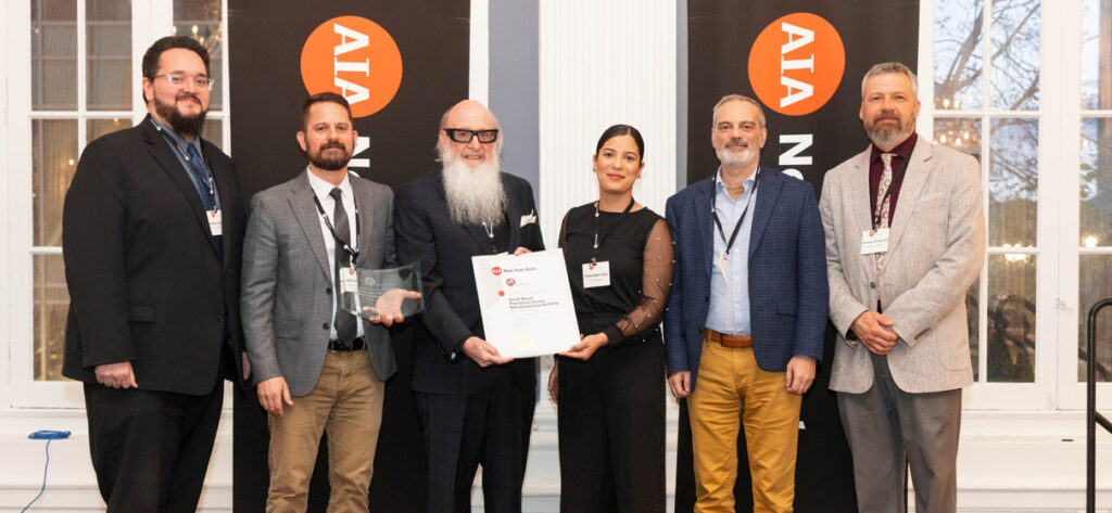 The STV team accepts their award at the 2025 Excelsior Awards.