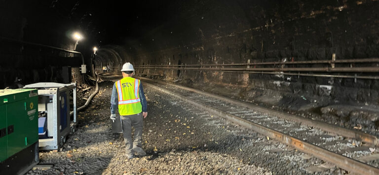 An STV team member at the site of the Howard Street Tunnel under construction.