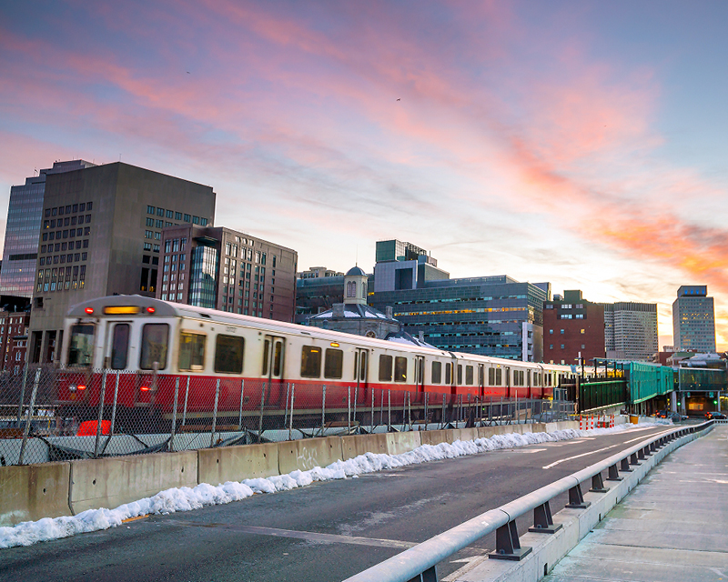 An MBTA Red Line train rides through Boston.