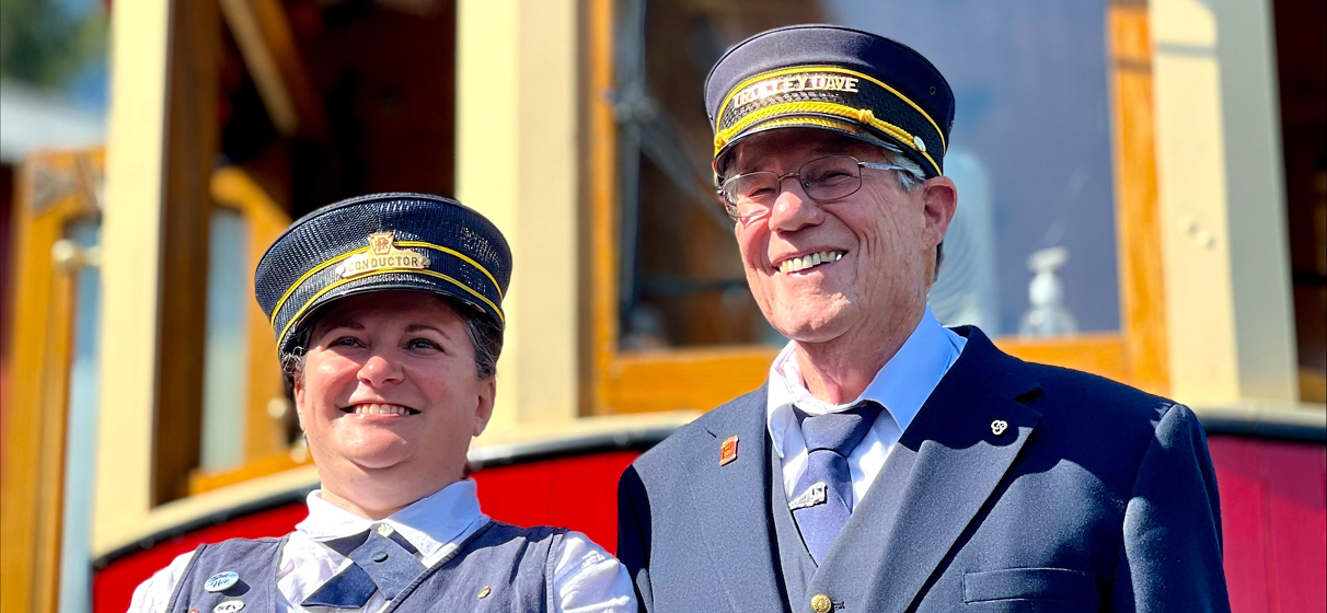 Michelle Veri (left in photo) in her conductor attire for the Willamette Shore Trolley, alongside a colleague of hers.