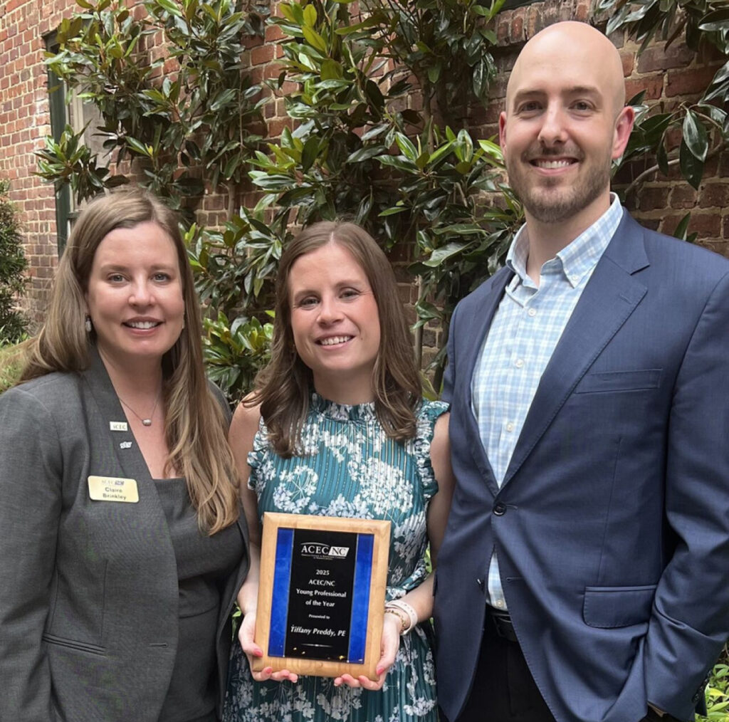 STV’s Claire Brinkley (left) and Patrick Livingston (right) celebrated Tiffany Preddy (center), who was named the 2025 Top Young Professional by ACEC North Carolina.