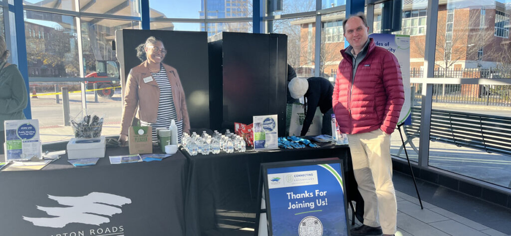 STV’s Eric Nelson stands next to Hampton Roads Transit project manager Sherri Dawson at a Connecting Chesapeake community pop-up event held at the Downtown Norfolk Transit Center.