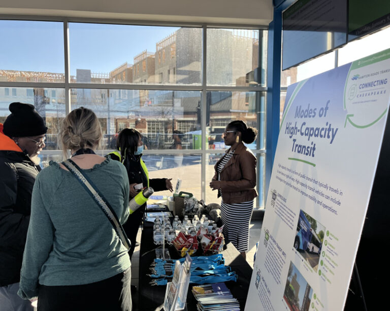 Hampton Roads Transit project manager Sherri Dawson speaks with community members at a Connecting Chesapeake pop-up event held at the Downtown Norfolk Transit Center.