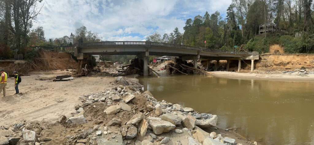 Flood waters from Hurricane Helene running under the US 64/US 74A Bridge in Chimney Rock, North Carolina.