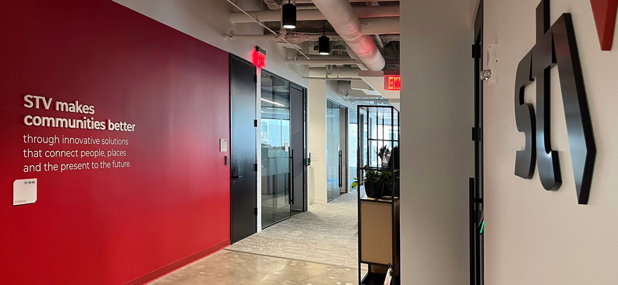 The entrance to the new STV office in Virginia Beach. The company purpose displayed as a graphic on the wall.