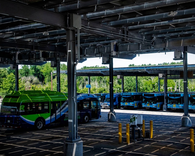 Flash BRT vehicles in electric charging staging area.