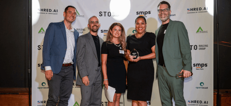group photo of STV Communications team posing with award at SMPS NY awards ceremony
