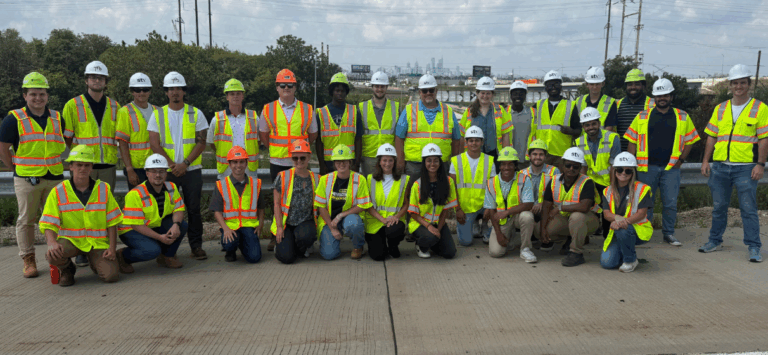 Group photo from a construction site detailing participants and mentors in the TQI Shared Intern Program in Pennsylvania