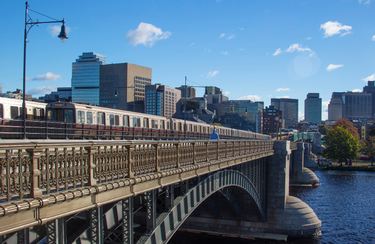 MBTA Red Line train crosses the Longfellow Bridge between Cambridge and Boston.