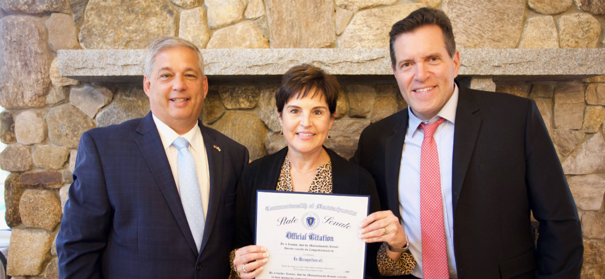 Eva Hamori, center in photo, receives the 2025 Lifetime Preservation Award from the North Andover Historical Society.