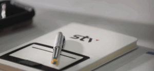 STV branded notebook with pen