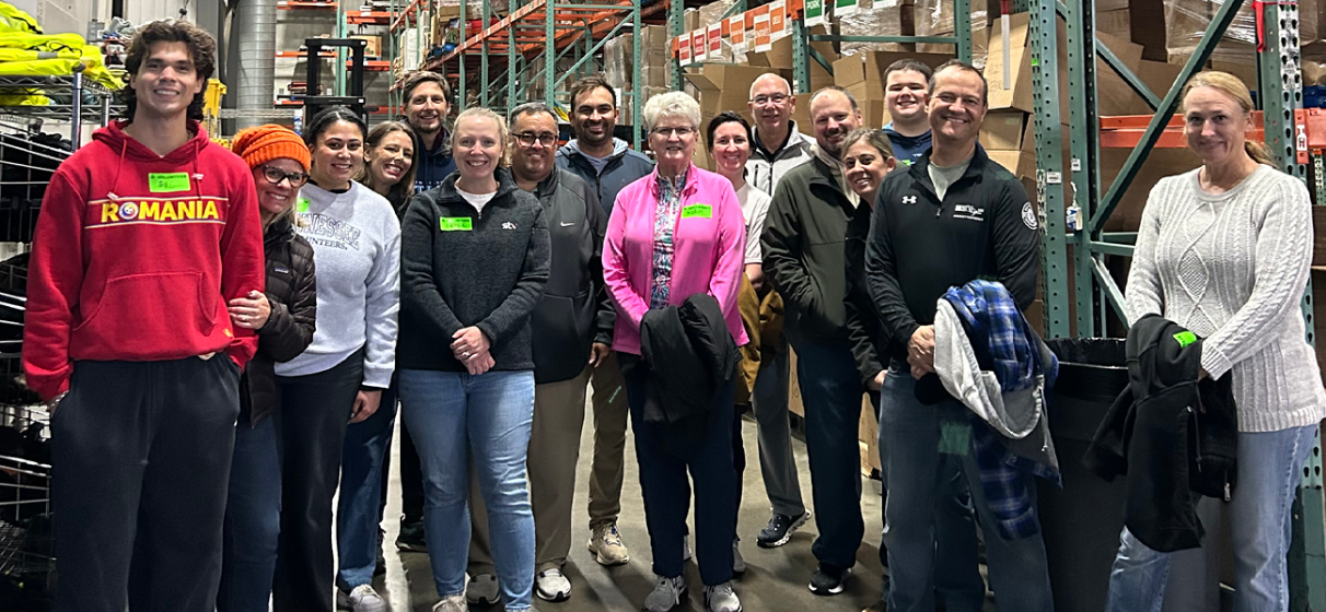STV's Franklin employees gather in a group photo at the Second Harvest Food Bank of Middle Tennessee.