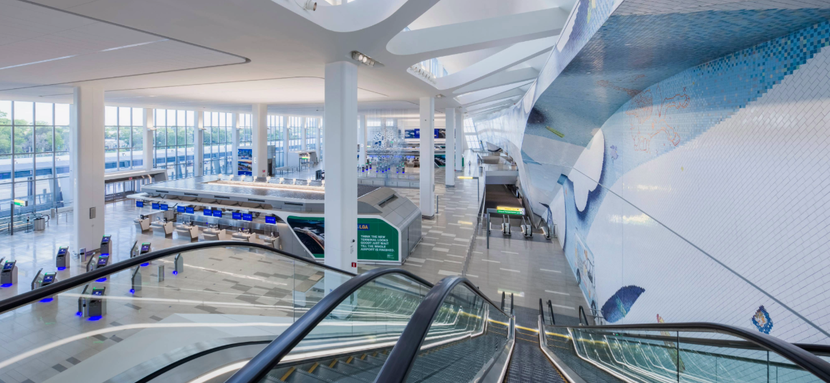 Interior view of escalator and check-in area of Terminal B at LaGuardia Airport in New York.