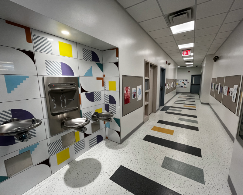View of hallway and water fountains at New York City 3K Center Corona in Queens, NY