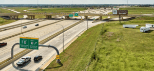 Overhead view of divided highway with grass