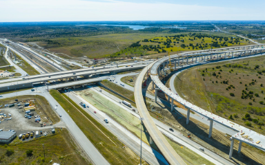 Drone shot of interconnected highways with traffic