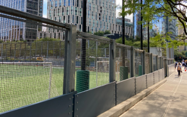 Battery Park baseball field with black fence