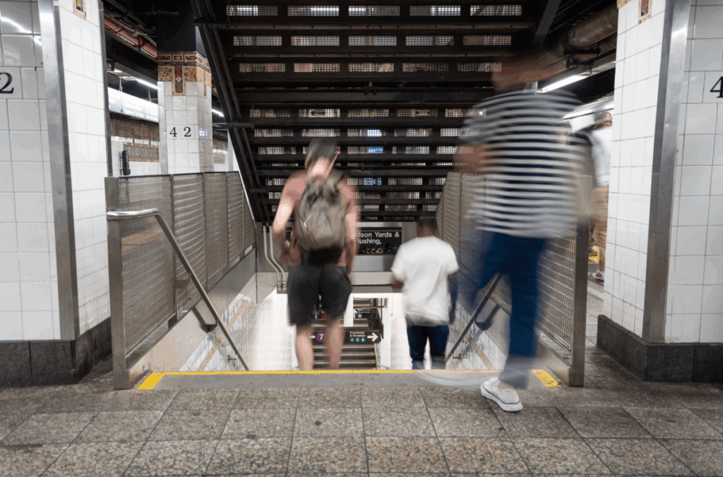 Commuters entering the pedestrian tunnel at Grand Central Terminal's subway station.
