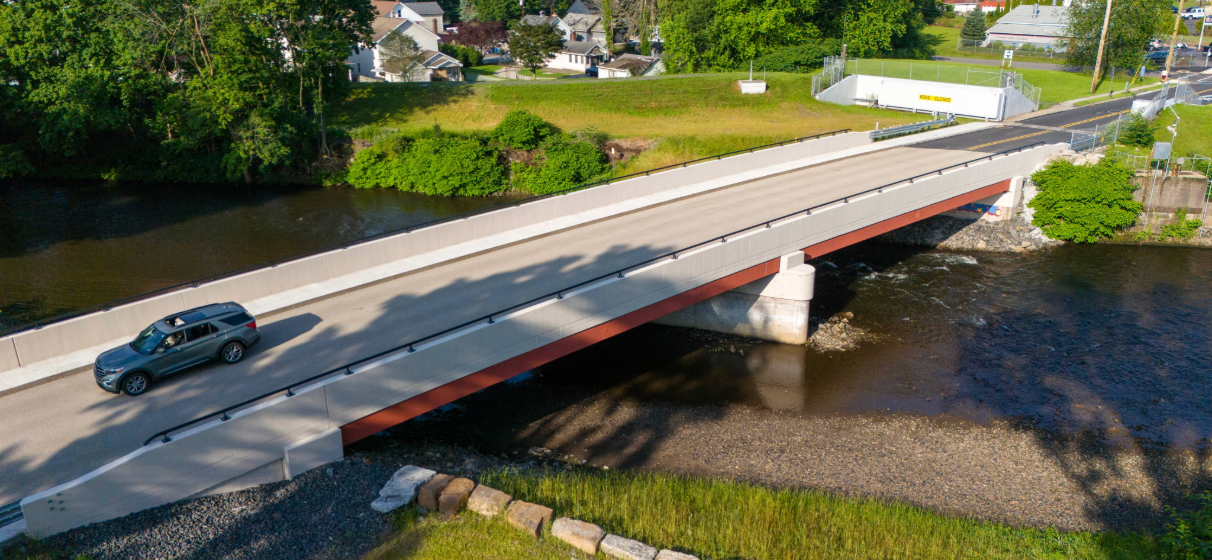 Aerial view of main bridge deck, with car passing over, of Parker Street Bridge in Scranton.